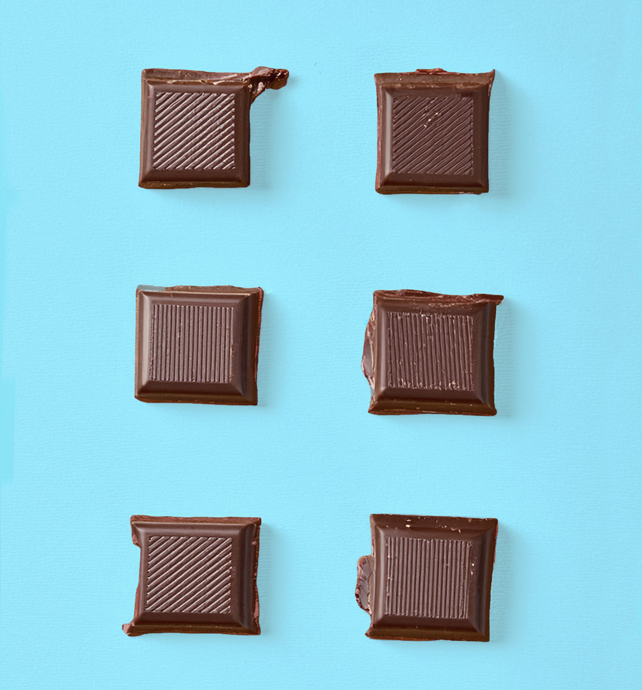 dark chocolate on blue background