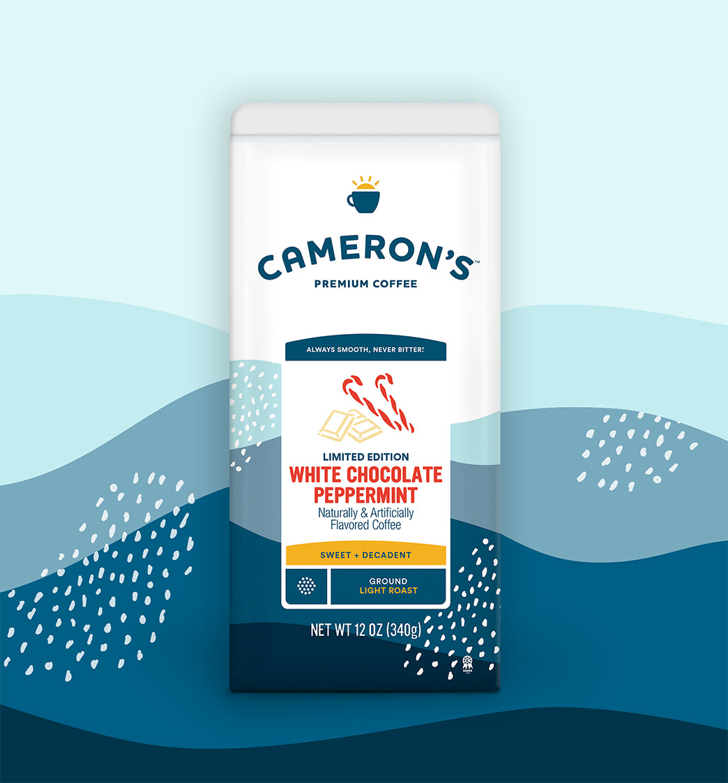 Cameron's White Chocolate Peppermint coffee package on a blue background