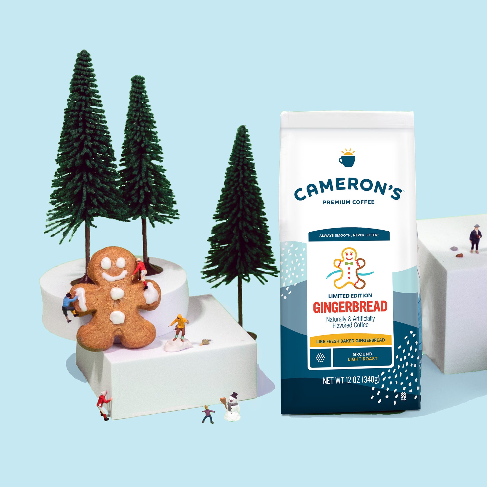 Cameron's Gingerbread coffee package with decorative gingerbread man and trees on a blue background