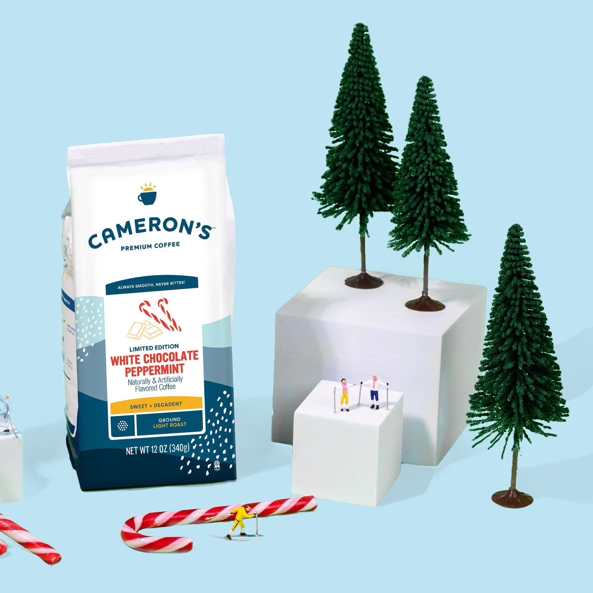 Cameron's coffee bag with Christmas trees and candy canes on a light blue background