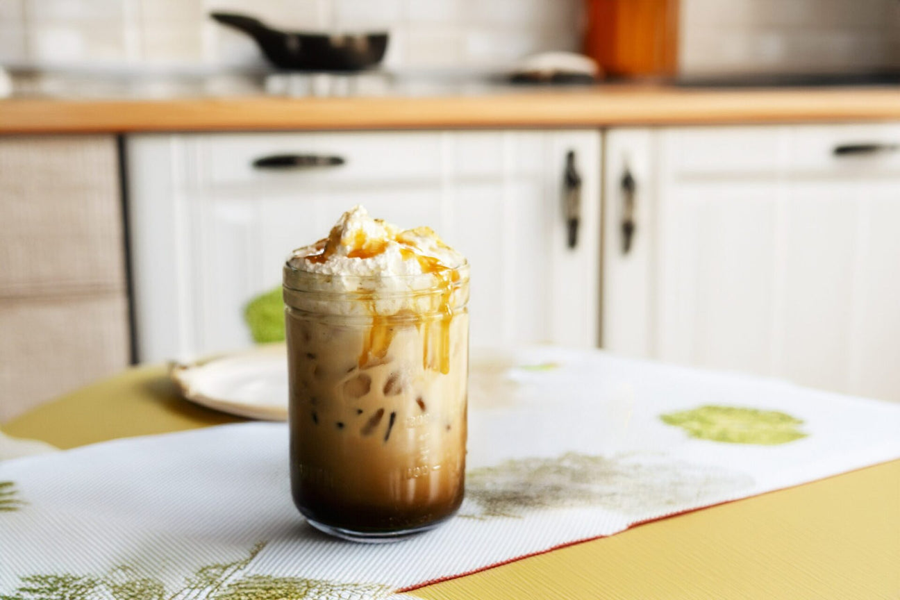 glass of ice coffee with whip cream