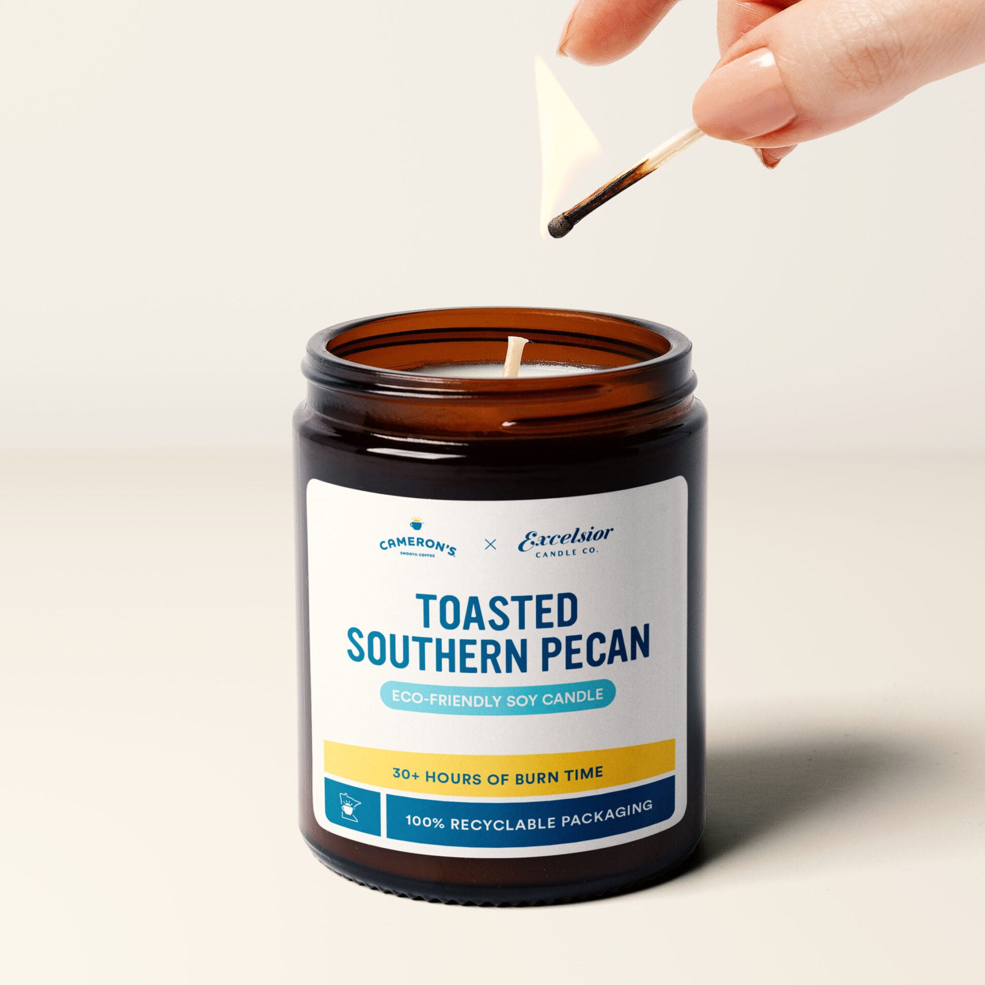 Toasted southern pecan scented candle in an amber glass jar