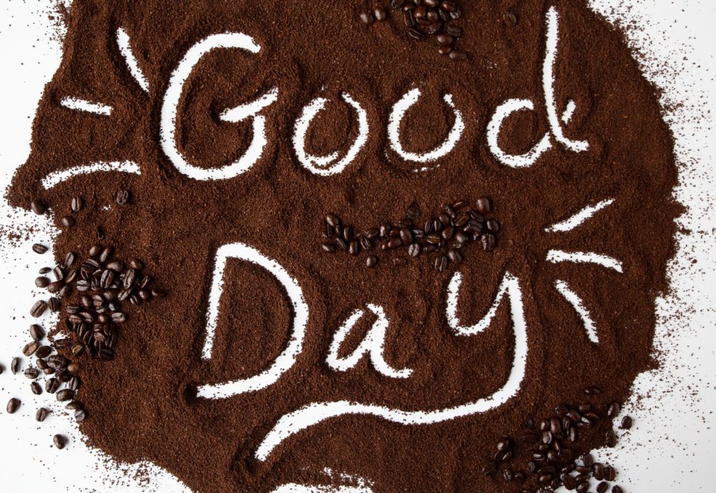 "Good Day" spelled out in Cameron's Coffee Grounds - How to Reuse Coffee Grounds in Your Garden